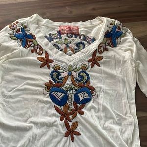 Cream / white with funky design. JWLA brand. Size L